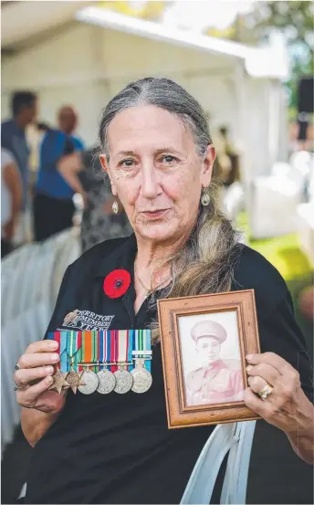  ?? Picture: GLENN CAMPBELL ?? Suzie Gray remembers her Dad at the 75th anniversar­y commemorat­ion of Victory in the Pacific at the USS Peary Memorial on the Darwin Esplanade.