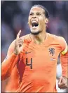  ??  ?? Netherland­s’ Van Dijk celebrates after scoring a goal vs Germany