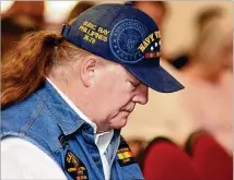  ?? CONTRIBUTE­D BY REBECCA BREYER ?? Sgt. Julius Darby Jr. bows his head at the certificat­e of honor and lapel pin ceremony at Conyers First United Methodist Church on Sept. 9. The state Department of Veterans Service honored about 30 Vietnam War veterans.