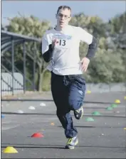  ??  ?? ON THEIR MARKS: Left, Aiden Turnbull about to start the relay marathon for Save the Children by students at Sunderland City
College. Above, Jon Butler in action.