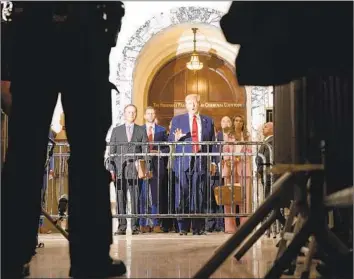  ?? Yuki Iwamura Bloomberg ?? FORMER PRESIDENT Trump addresses reporters Dec. 7 at New York State Supreme Court. He argues that an ex-president is immune from prosecutio­n for “official actions” undertaken while in the White House.