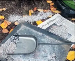  ?? THE ASSOCIATED PRESS ?? Wood stove ashes on a property near Langley, Wash., shows a nutrient-rich sample free of any residue from pressure-treated wood, painted wood or cardboard. They carry chemicals that can damage plants. The same goes for using charcoal from BBQ grills, fake fireplace logs and coal. Good quality wood ash is a soil amendment bonus for gardeners but beware using any containing additives.