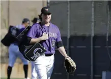  ?? Darron Cummings, Associated Press file ?? LHP Ryan Rolison, seen at spring training on Feb. 15 in Scottsdale, Ariz., will be in the 52-man player pool for the Rockies.