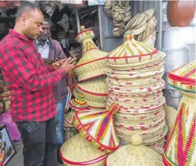  ?? EVA ELIASON VIA THE ASSOCIATED PRESS ?? A colorful display of wares at the main market of Addis Ababa, capital of Ethiopia. The market is called the Merkato, a word borrowed from Italian and one of the few vestiges of Italy’s short-lived colonizati­on of Ethiopia in the 1930s.