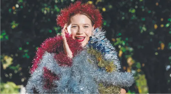  ??  ?? Melbourne expat Beth Caird is very excited at the prospect of potentiall­y being able to go home for Christmas. Picture: Glenn Campbell