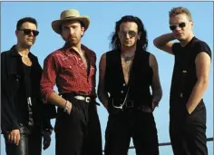  ??  ?? U2 on their way to a first UK number one in 1988.