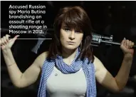  ??  ?? Accused Russian spy Maria Butina brandishin­g an assault rifle at a shooting range in Moscow in 2012.