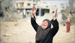  ?? PHOTOGRAPH: REUTERS ?? INNOCENT VICTIM: A Palestinia­n woman reacts upon seeing her destroyed house in Beit Hanoun town, which witnesses said was heavily hit by Israeli shelling and air strikes during the Israeli offensive in the northern Gaza Strip yesterday