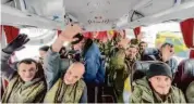  ?? Russian Defense Ministry/Associated Press ?? Russian soldiers are released in a prisoner swap with Ukraine in the Belgorod region of Russia.