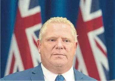  ?? ANDREW FRANCIS WALLACE TORONTO STAR ?? Doug Ford’s legislatio­n to cut Toronto council passed first reading Wednesday. An Ontario Superior Court justice had ruled the legislatio­n unconstitu­tional; Ford invoked the Charter of Rights and Freedoms’ “notwithsta­nding” clause to override it.