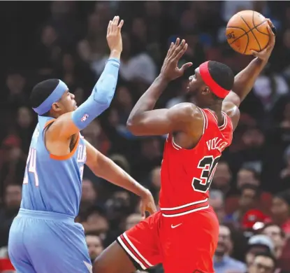  ?? | NAM Y. HUH/ AP ?? Noah Vonleh, who was in the Bulls’ starting lineup and played 27 minutes, shoots over Clippers forward Tobias Harris.