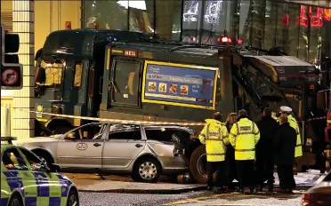  ??  ?? Christmas carnage: The bin lorry killed six people on December 22, 2014 in Glasgow