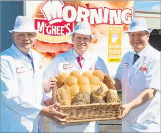  ??  ?? WINNING RECIPE: Stuart, Ian and Gordon McGhee mark McGhee’s Bakery lifting the Scottish Baker of the Year award.