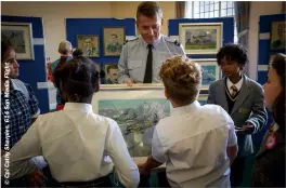 ?? ?? Air Commodore Williams showing a group of school children around the Cardiff exhibition