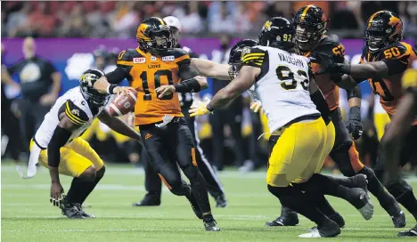  ?? DARRYL DYCK/THE CANADIAN PRESS ?? Quarterbac­k Jonathon Jennings and the B.C. Lions moved the ball against the Hamilton Tiger-Cats Friday, but their drives stalled in the red zone too many times, allowing the visitors to kick a game-winning field goal in the dying seconds at B.C. Place.