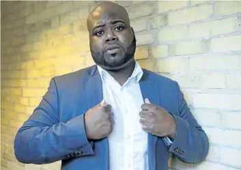  ?? FRANK GUNN/ THE CANADIAN PRESS ?? Lawyer Anthony Morgan poses for a photo in Toronto on Thursday. At Anthony Morgan’s office, the calls keep coming: parents of young black men hoping their son’s marijuana possession charge will be wiped clean when the country legalizes the drug this...