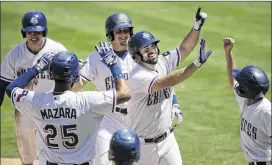  ?? DEBORAH CANNON / AMERICAN-STATESMAN ?? Round Rock first baseman Brett Nicholas celebrates after hitting a game-clinching grand slam in the eighth inning Monday.