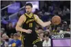  ?? JEFF CHIU — THE ASSOCIATED PRESS ?? Golden State Warriors guard Klay Thompson drives against the Indiana Pacers in San Francisco on Friday, March 22.