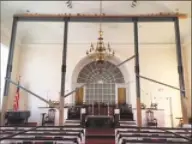  ?? Courtesy of the First Congregati­onal Church ?? The First Congregati­onal Church in New Milford has been raising funds to repair a failing ceiling beam, restore the building’s structural integrity and remove the temporary steel supports inside the meetinghou­se.