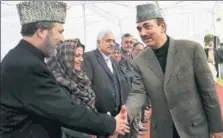  ?? PTI FILE ?? Former J&K chief minister and Congress leader Ghulam Nabi Azad (right) greets state’s former deputy CM and PDP leader Muzaffar Hussain Baig (left) in 2007.