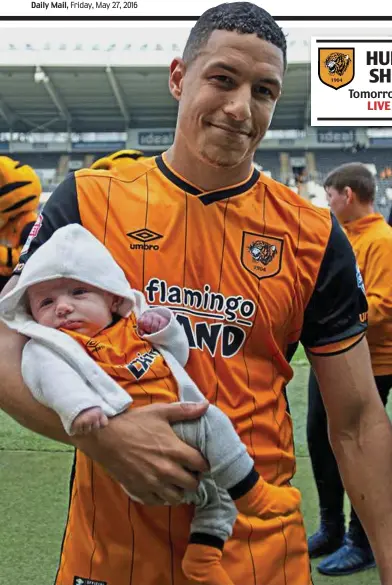  ?? RUSSELL HART ?? Proud as punch: Jake Livermore takes his baby boy Jayce on to the pitch following Hull’s final League game of this season