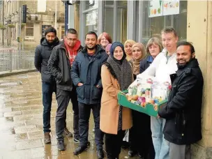  ?? Catherine Smyth ?? Sultana Hussain, centre, with members of Positive Start and Food Group volunteers and supporters outside the Bury Road building