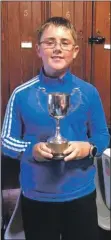  ??  ?? Ruairidh Scullion won the Archie Hunter cup in the Junior Open at Corrie.