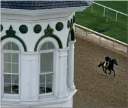  ?? AP PHOTO BY CHARLIE RIEDEL ?? Kentucky Derby entrant Simplifica­tion works out at Churchill Downs Thursday, May 5, 2022, in Louisville, Ky. The 148th running of the Kentucky Derby is scheduled for Saturday, May 7.