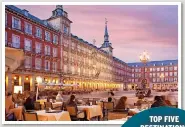  ?? ?? SPANISH AYES: Mainland Spain has proved a top attraction. Above, nightlife in Madrid’s
Plaza Major and below, the city’s vast
San Miguel Market