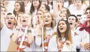  ?? Krista Benson / For Hearst Connecticu­t Media ?? St. Joseph fans cheer during the Cadets’ win over top-ranked New Canaan on Saturday.