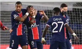  ?? Photograph: Franck Fife/ AFP/Getty Images ?? Paris Saint-Germain’s players celebrate progress to the last four of the Champions League, despite losing 1-0 on the night at home to Bayern Munich.