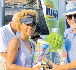  ?? ?? Amateur champion Chandie James (left) accepts a gift basket from Couples San Souci General Manager Pierre Battaglia.