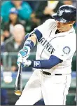  ??  ?? Seattle Mariners’ Leonys Martin hits a two-run walk-off home run during the ninth inning of a baseball game against the Oakland Athletics on May
24, in Seattle. (AP)