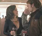  ?? JONATHAN OLLEY ?? Qi’ra (Emilia Clarke) reunites with her old sweetheart, Han Solo (Alden Ehrenreich), in “Solo: A Star Wars Story.”