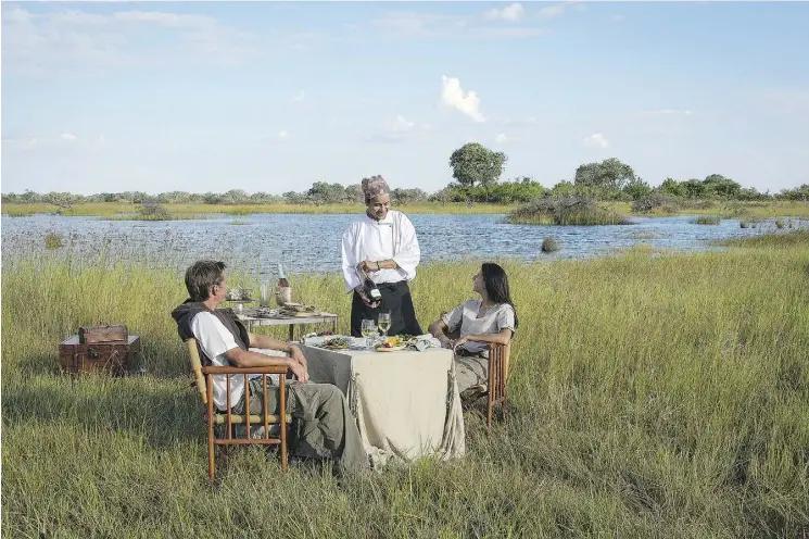  ?? DANA ALLEN ?? Candlelit dinners and daily tea service featuring world-class canapés and sweets are offered on the Vumbura Plains in Botswana’s Okavango Delta.