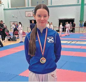  ?? ?? Golden girl Keri Robertshaw was all smiles after winning a gold medal for Scotland