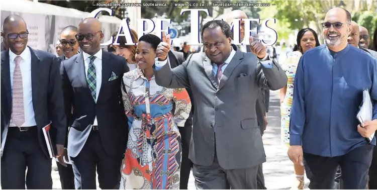  ?? | PHANDO JIKELO African News Agency (ANA) ?? FINANCE Minister Tito Mboweni and his team, including SA Revenue Service Commission­er Edward Kieswetter on his left, arrive in Parliament for the Budget speech yesterday. The Budget speech unpacked how the funds would be allocated to government department­s and state-owned entities.