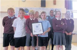  ??  ?? St Nicholas pupils with their Sports Mark Award