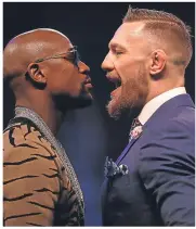  ??  ?? Mayweather and McGregor square up to each other.