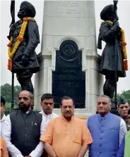  ?? — PTI ?? Union ministers Hansraj Gangaram Ahir, R.K. Singh, RSS leader Indresh Kumar and MoS for external affairs V.K. Singh after paying homage at Teen Murti Haifa Chowk in New Delhi on Saturday.