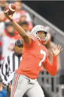  ?? JAMIE SABAU/GETTY IMAGES ?? Ohio State quarterbac­k Dwayne Haskins threw five touchdown passes against Michigan on Saturday. The Buckeyes have won 14 of the last 15 games between the two teams.