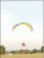  ??  ?? If you see a yellow and gray glider up in the sky in the Lincoln area, it’s most likely Jeff O’Brien, a captain with Prairie Grove Police Department, who has a new hobby, paraglidin­g.