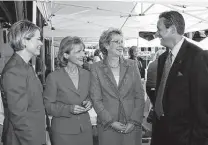  ?? Contributo­r file photo ?? Caryn Hasslocher, second from right, is shown in 2007. She and her sister Susan have sued their brother Jimmy over their father’s estate.