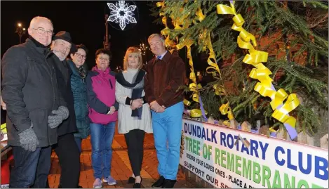  ??  ?? Tree of Remembranc­e.....Barry McDonnell, Fergus McArdle, Criona O’Reilly, Catherine White, Mary Martin and Seamus McDermott at the Dundalk Rotary Club Tree of Remembranc­e launch