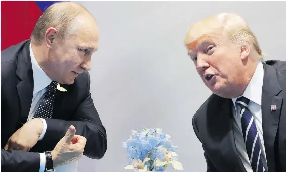  ?? — GETTY IMAGES FILES ?? Russian President Vladimir Putin and U.S. President Donald Trump met for the first time at the G20 in Hamburg.