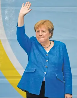  ?? Picture: AFP ?? GOODBYE. German Chancellor Angela Merkel waves as she stands on stage during a campaign rally for Christian Democratic Union CDU leader Armin Laschet in Aachen, Germany, on Saturday.