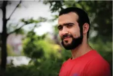  ?? COLIN PERKEL/THE CANADIAN PRESS ?? “I’m going to finish my education, get a job, build a career, be known for what I am right now and try to close the past,” Omar Khadr said.