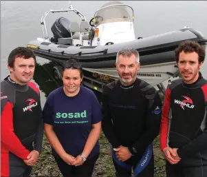  ??  ?? Brian Connelly, Derek Lynch and Liam Reilly, who will water ski to the Isle of Man, pictured with Michelle Breen, representi­ng SOSAD.