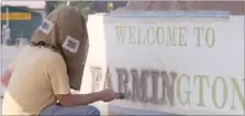  ?? LYNN KUTTER ENTERPRISE-LEADER ?? Russell House with R&M Lettering in Lavaca uses river sand to blast letters into the newest “Welcome to Farmington” sign. The sign is located near Legend Realty at 196 E. Main St. The city plans to landscape around the sign this fall.