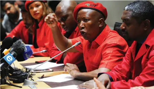  ?? | CINDY WAXA African News Agency Archives ?? Julius Malema and EFF members addressing the media earlier this year. Malema’s outbursts are in violation of the Commission­s Act 8, says the writer.